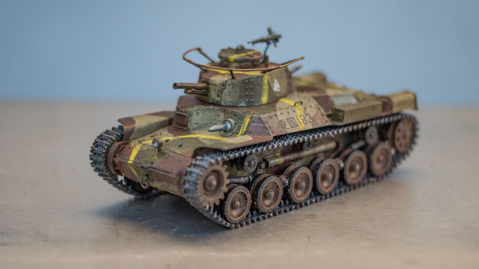 A realistic model tank showcasing intricate details and weathering effects, perfect for hobbyists and collectors.
